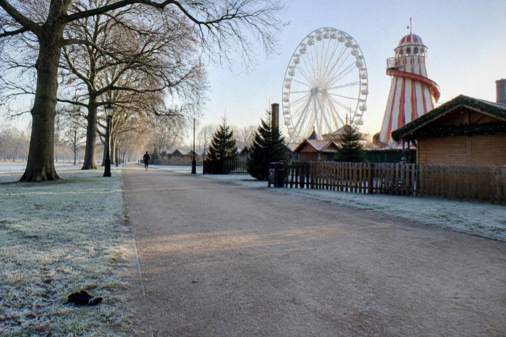 Frosty open parkland path in central London on a still winter morning